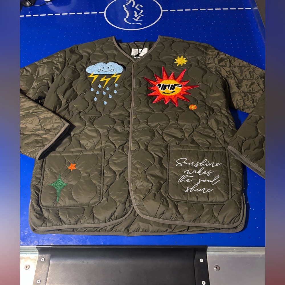 Green first row jacket